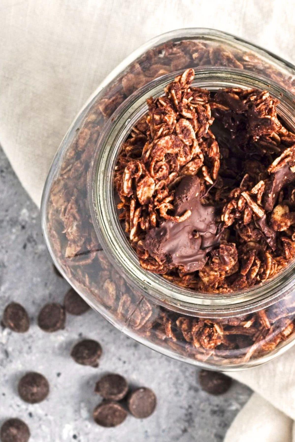 Top down view of a jar of coconut chocolate granola
