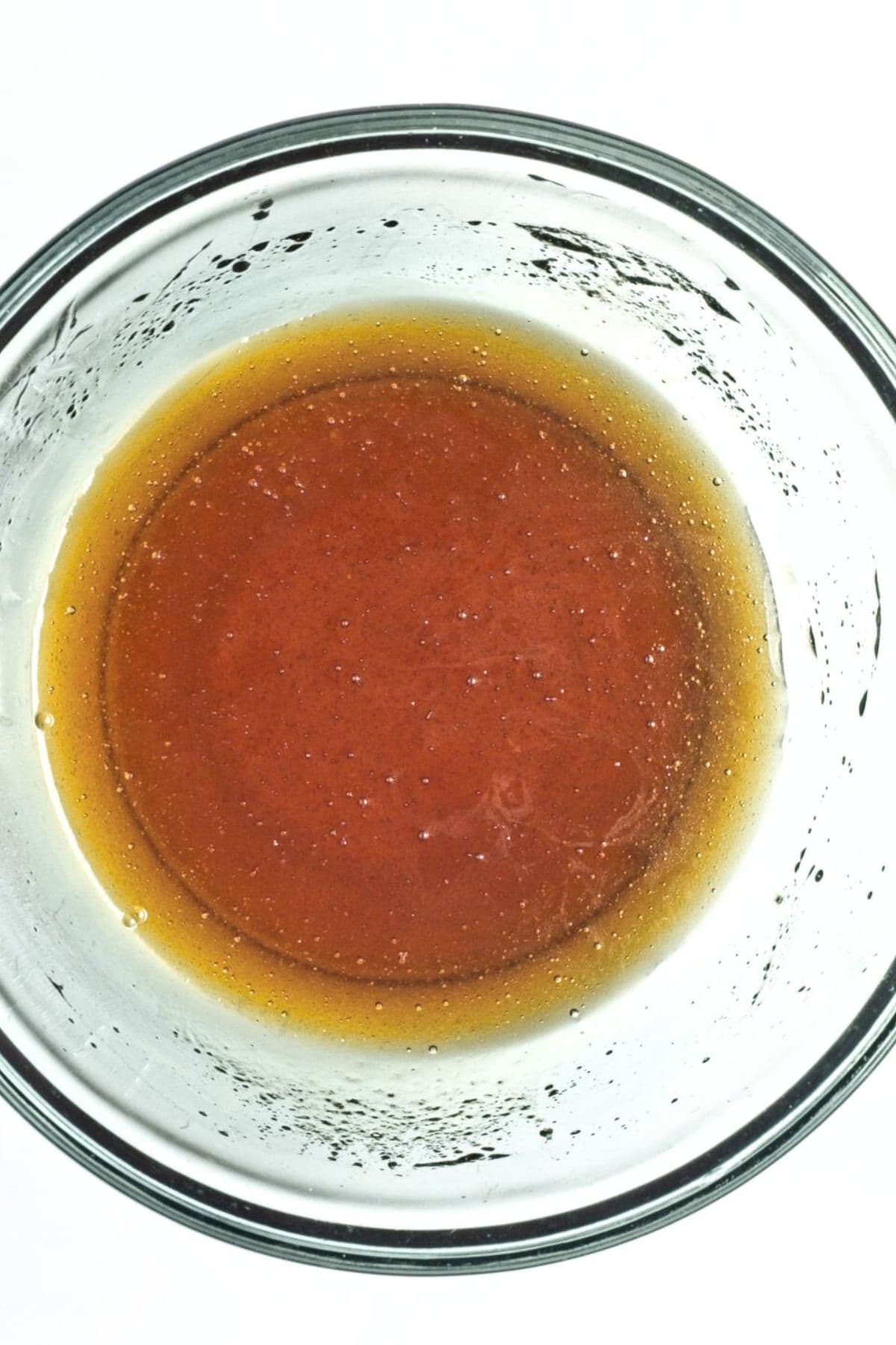 a bowl of light brown liquid