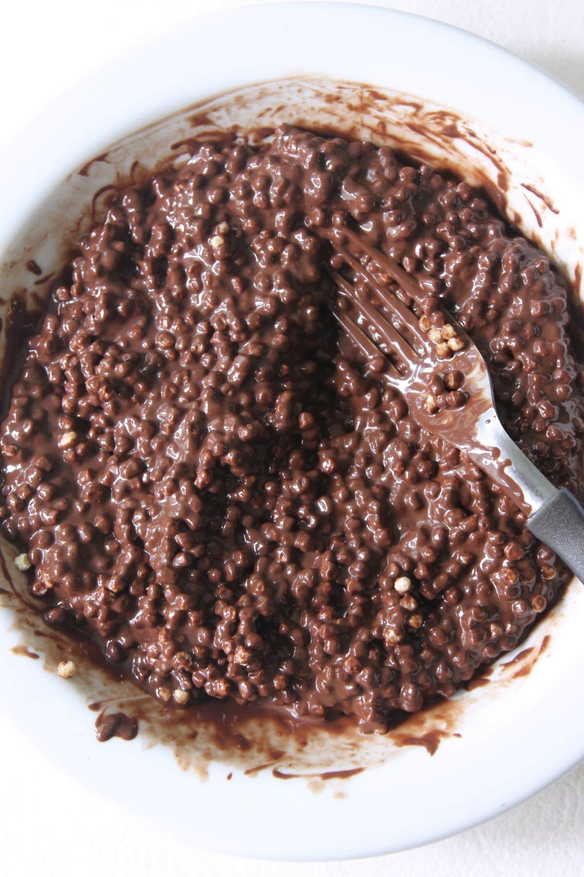 Chocolate quinoa pop mixture in bowl.