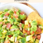 A bowl of salsa and tortilla chips