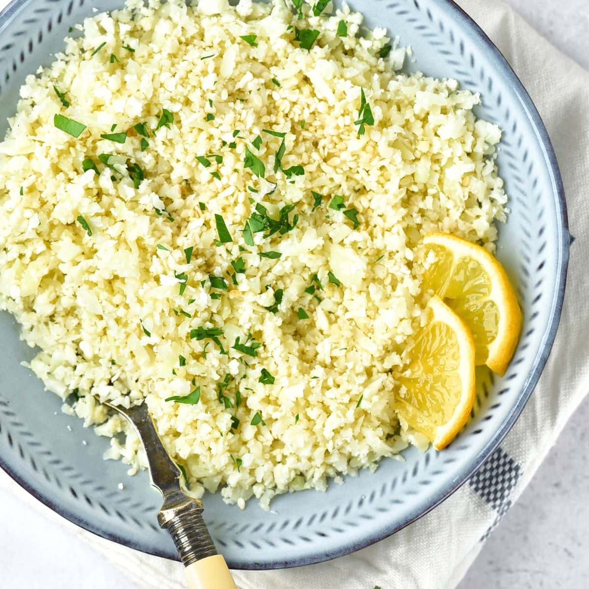 Top down view of a bowl of cilantro cauliflower rice