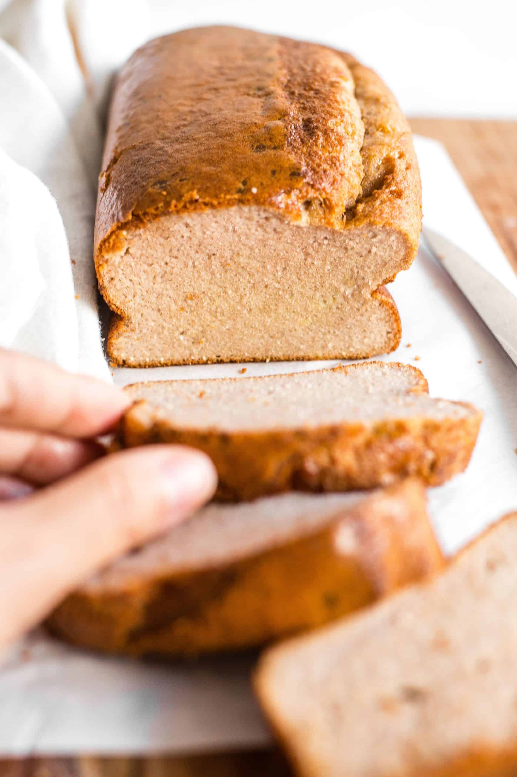 Reaching for a slice of low carb keto coconut bread.