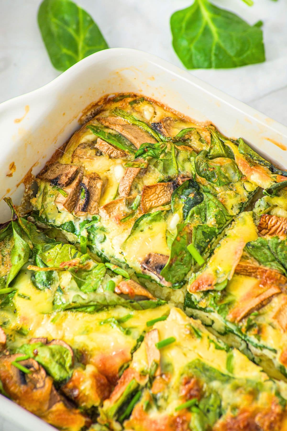 Baked eggs with cottage cheese in casserole dish