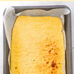 Freshly baked cottage cheese flatbread in sheet pan.