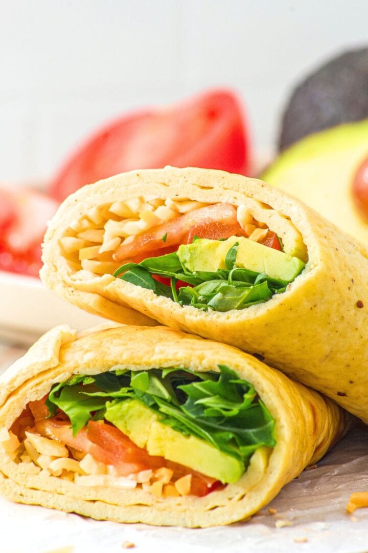 Up close shot of sliced cottage cheese and egg flatbread wrap.