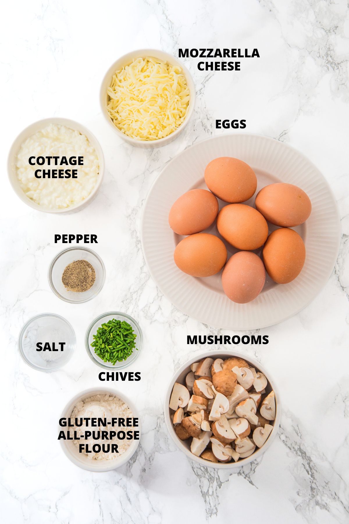 Ingredients for cottage cheese and egg muffins laid on white board