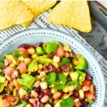 Top down view of vegan cowboy caviar and tortilla chips