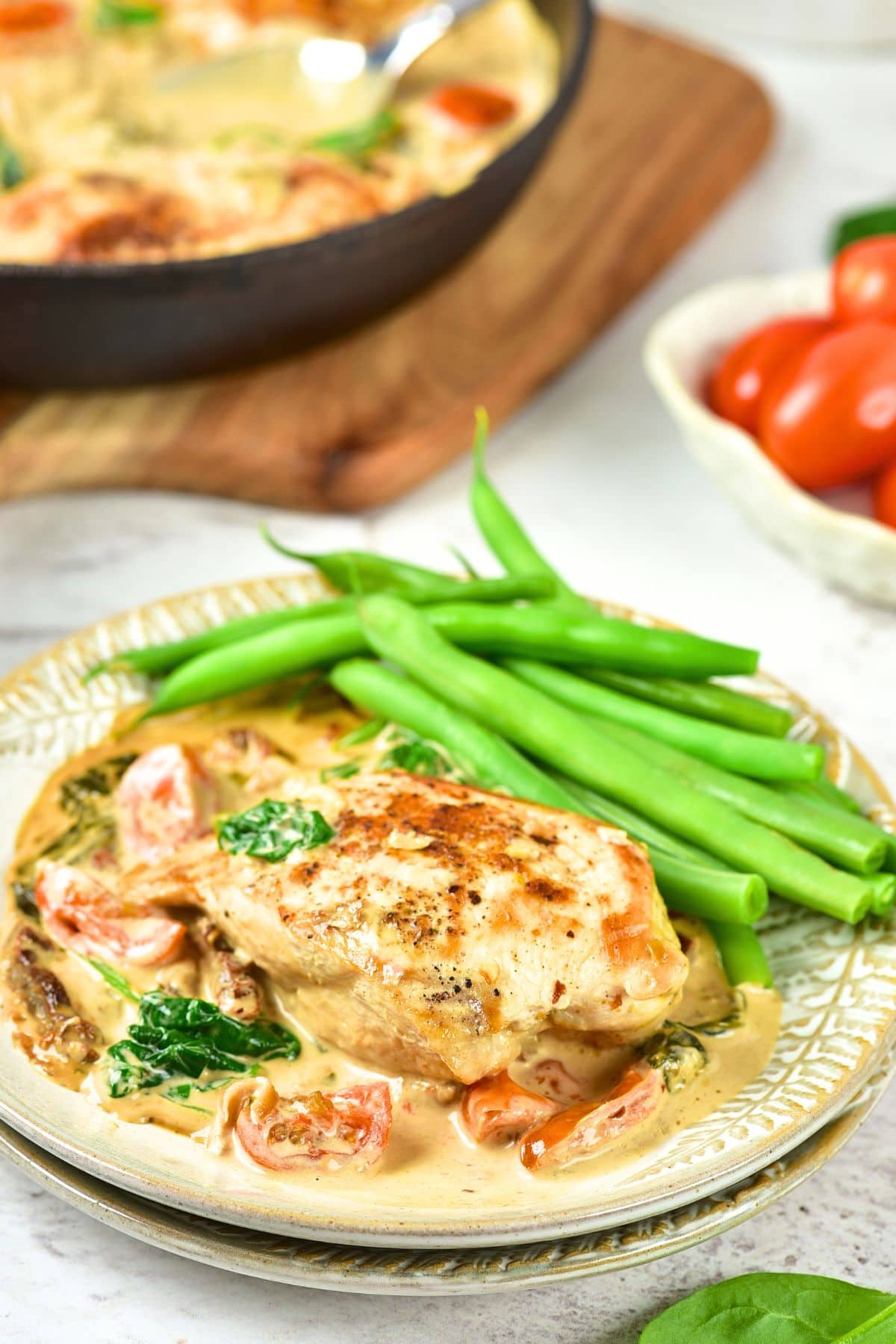 Dairy-Free Creamy Tuscan Chicken (Gluten-Free) A plate of dairy-free creamy Tuscan chicken