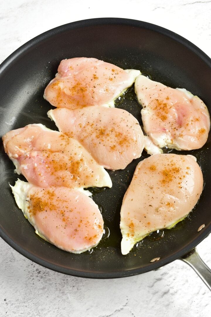 Cooking chicken breasts in skillet