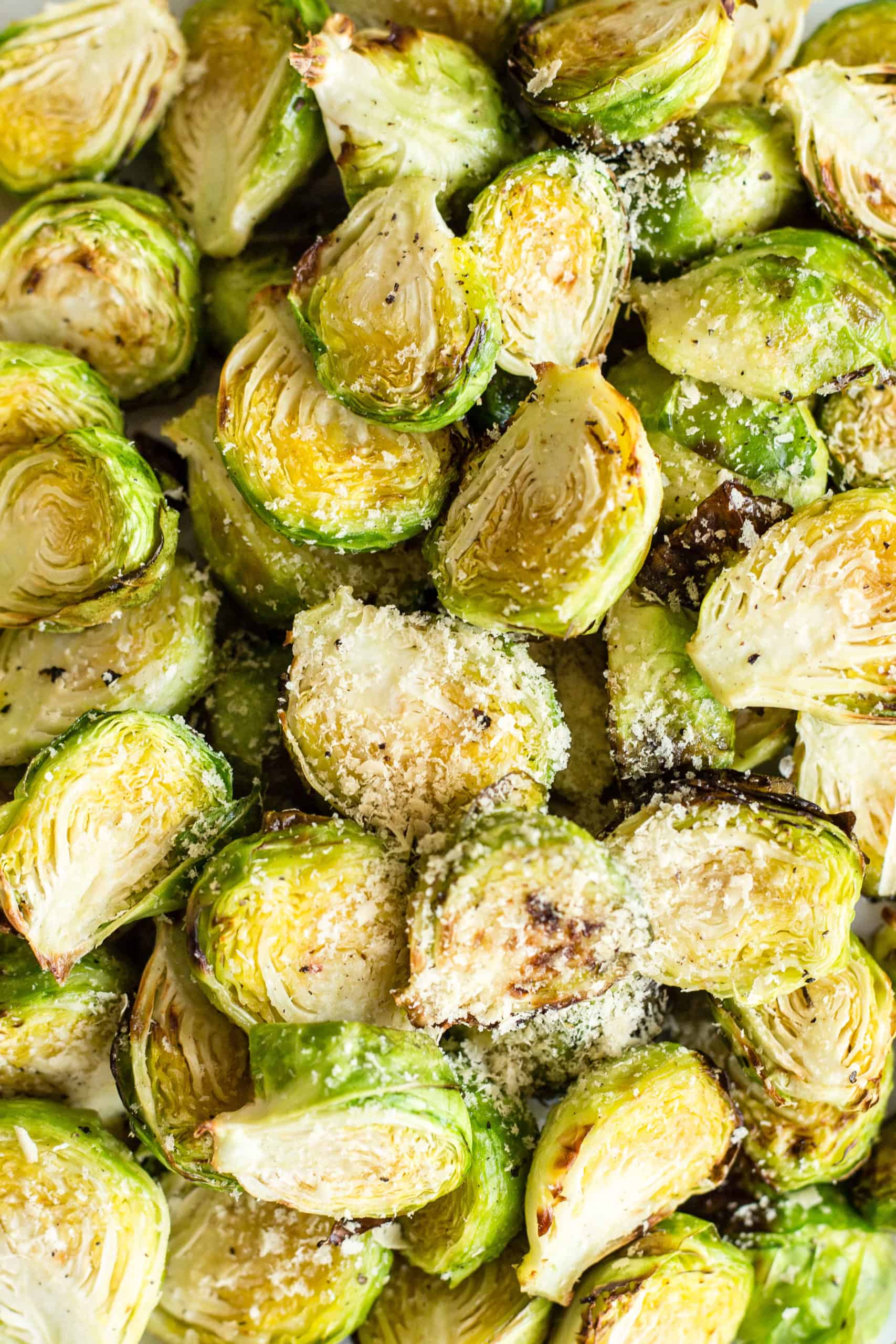 A close up shot of cooked Brussels sprouts.