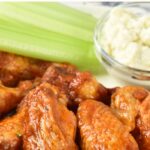 Up close view of a plate of gluten-free buffalo wings