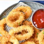 Up close view of a plate of fried battered calamari