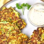 A plate of zucchini corn fritters