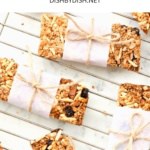 Parchment-wrapped granola bars on wire rack.