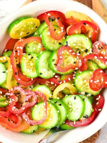 Top down view of bowl of cucumber pepper salad