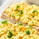 Curried egg salad sandwiches on plate