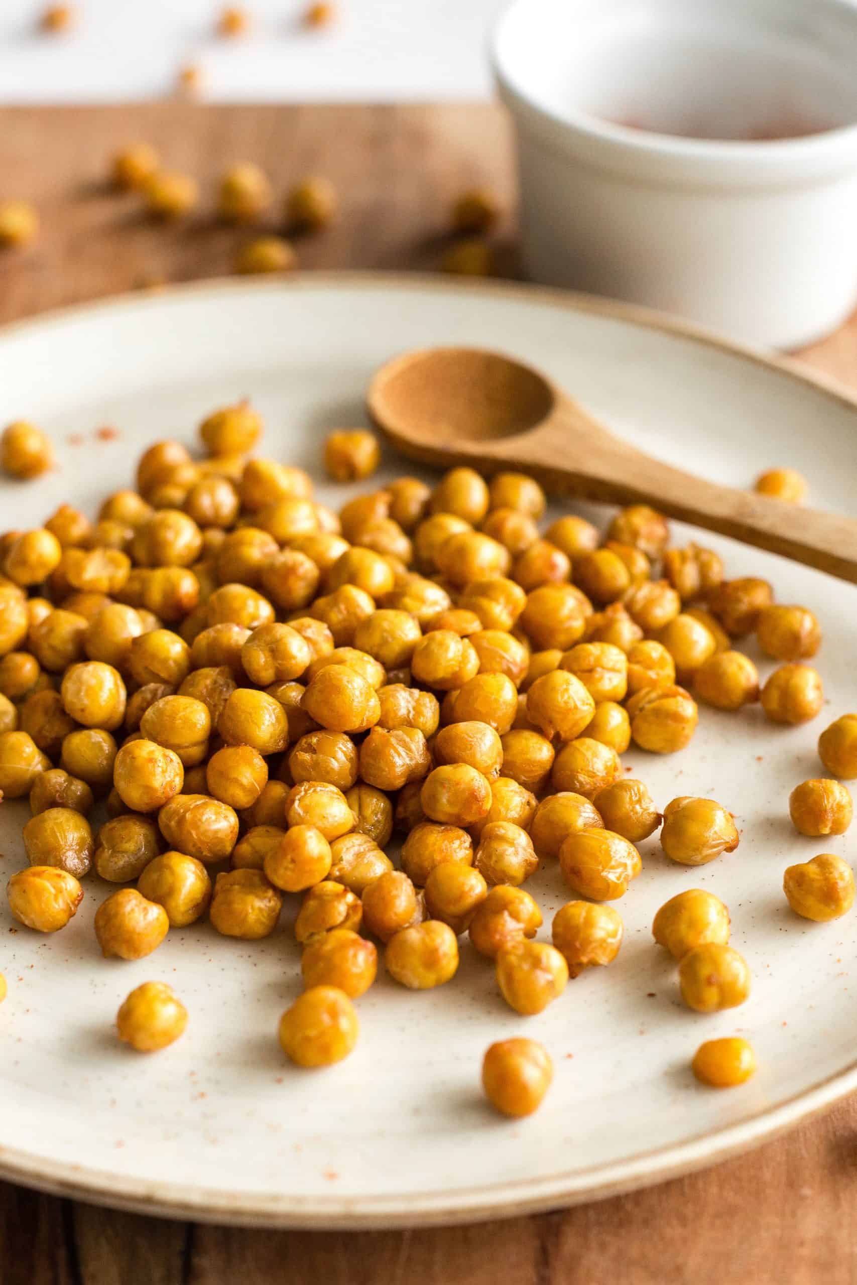 Up close shot of chickpeas on a plate.