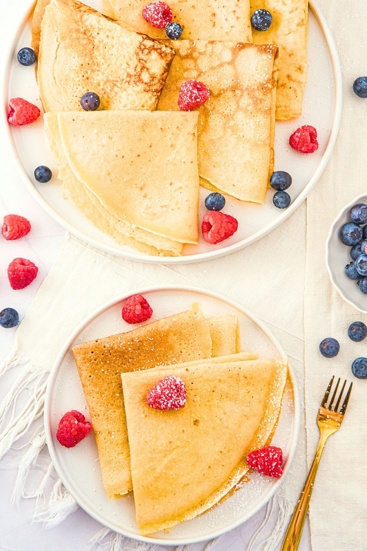 Plate of gluten-free crepes with almond flour and berries