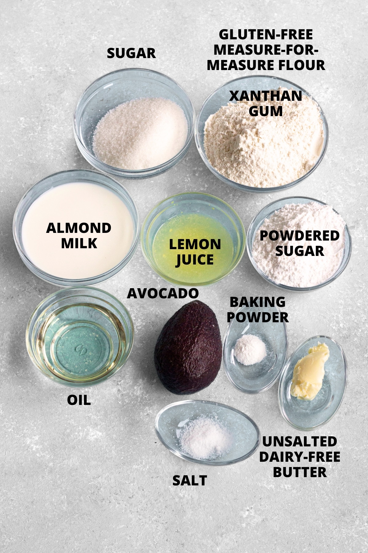 Easy Avocado Cake Recipe (Gluten-Free, Vegan) Top down view of ingredients for easy avocado cake recipe laid out on board.