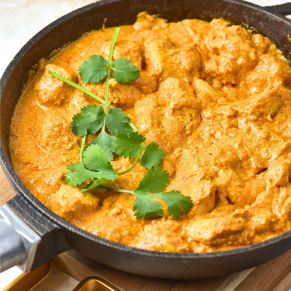 Butter chicken in a cast iron skillet
