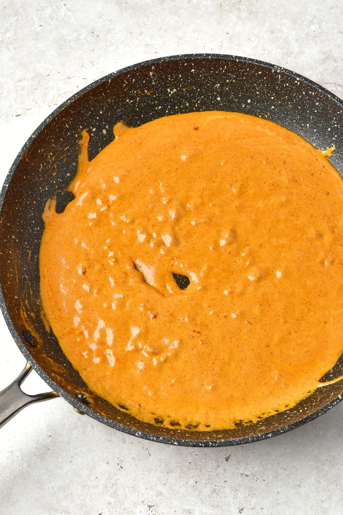 Butter chicken sauce in skillet
