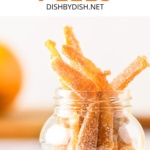 Candied orange peel in a glass jar.