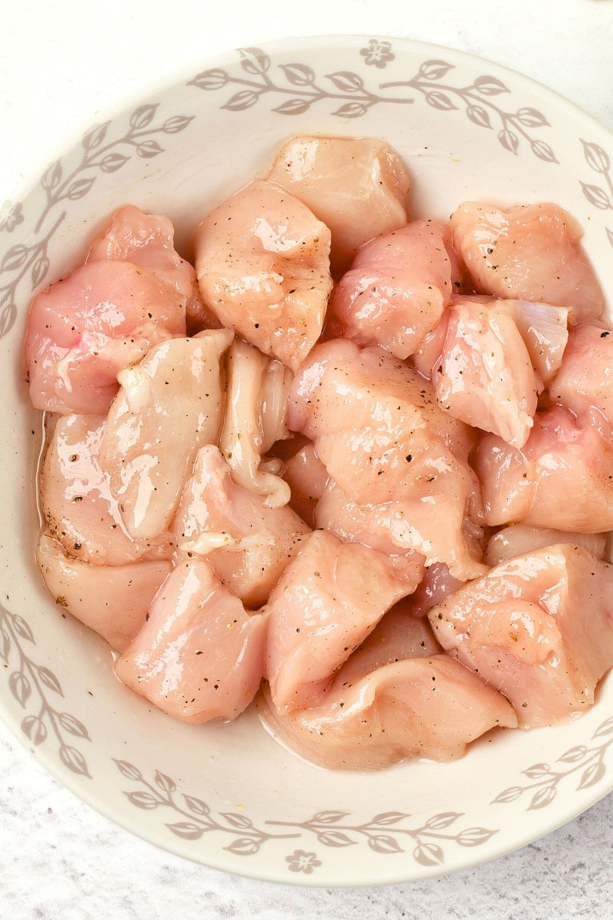 Chicken cubes in a bowl.