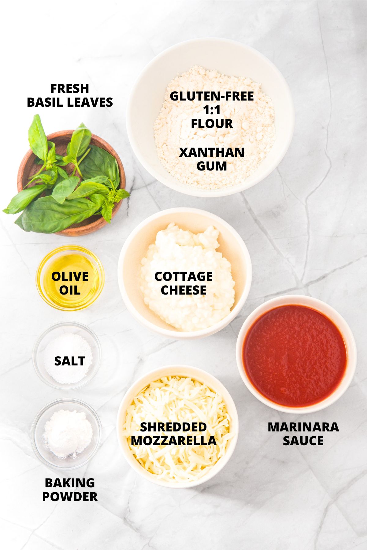 Ingredients for cottage cheese pizza crust recipe laid out on board