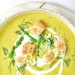 Top down view of a big bowl of asparagus potato soup