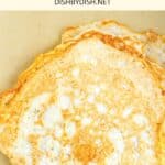 Top down view of egg white tortillas on parchment.