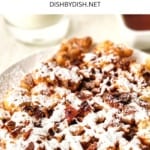 Funnel cake dusted with powdered sugar.