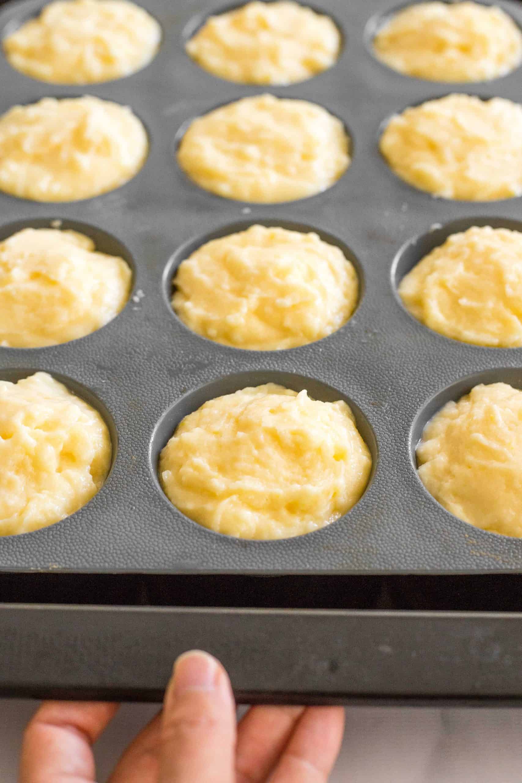 Muffin batter in a silicon muffin mold.