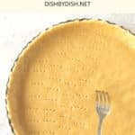 Poking holes into tart dough.