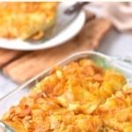 A fork in a baking dish with half-eaten casserole.
