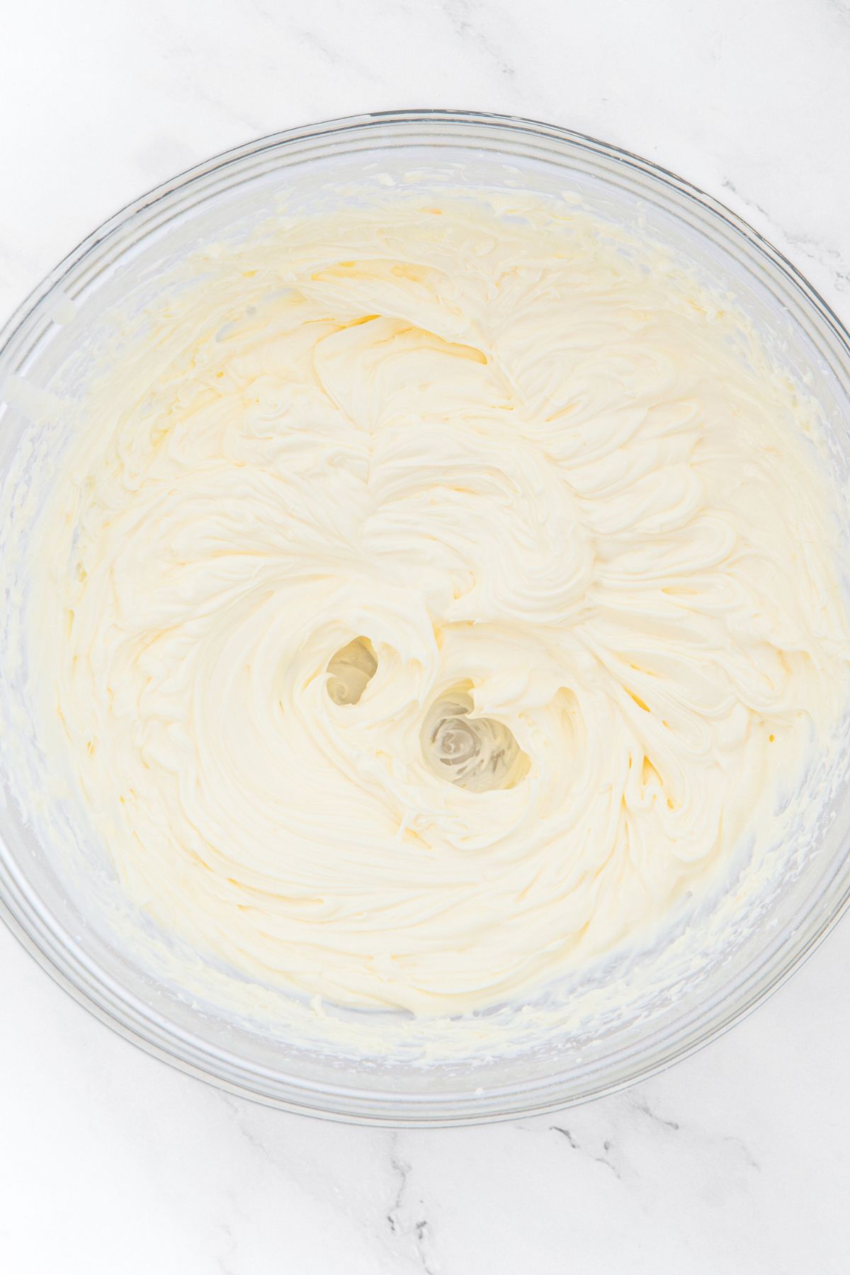 Whipped cream in glass bowl