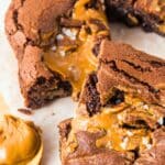 Top down view of peanut butter brownies on parchment paper.