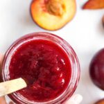 Top down view of a jar of easy plum jam (without pectin)