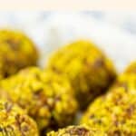 Up close shot of gluten-free energy bites on plate.