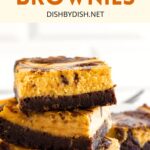 A stack of pumpkin swirl cheesecake brownies