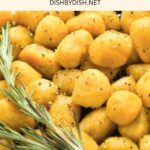Up close view of easy pumpkin gnocchi with a sprig of rosemary