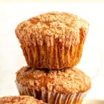 Sweet potato muffins piled on top of each other.