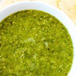 Top down view of a bowl of tomatillo sauce