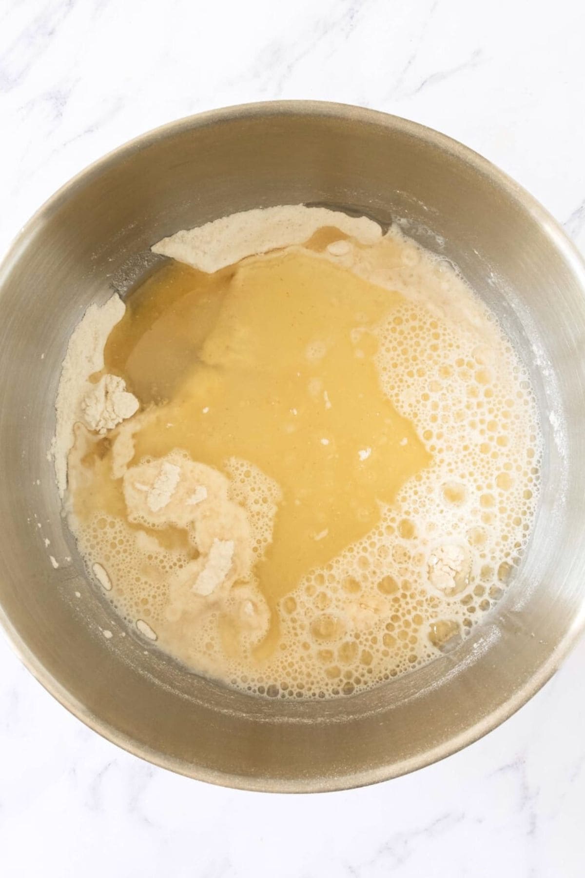 Mixing oil, water and flour mixture.