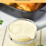 A serving jar of chicken gravy.