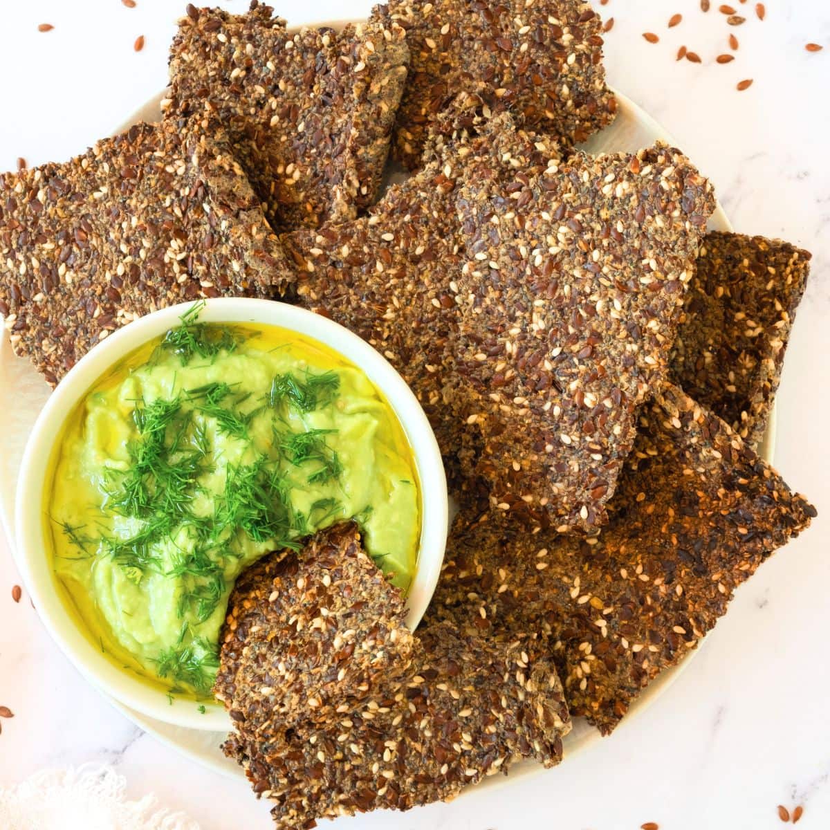 Flaxseed crackers and guacamole
