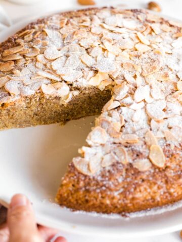 Half-sliced gluten-free almond cake