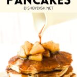 Pouring maple syrup over pancakes