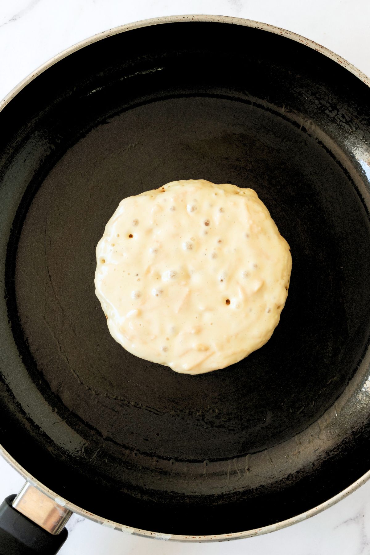 Cooking pancake batter in skillet