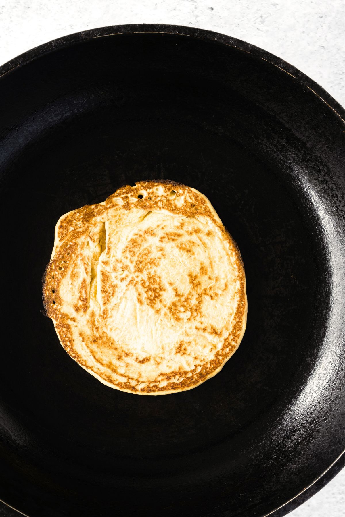 Cooked pancake in skillet