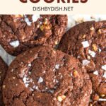 Top down view of chocolate walnut cookies sprinkled with sea salt